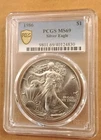 1986 1 Oz Silver Eagle $1 “First Year of Issue - Key Date” PCGS: MS69 #C889