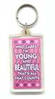 Vintage "Who Cares I'm Young and Beautiful That's All That Counts" Keychain — photo 1