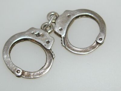 UNIQUE SMALL STERLING SILVER HAND CUFFS CHARM!