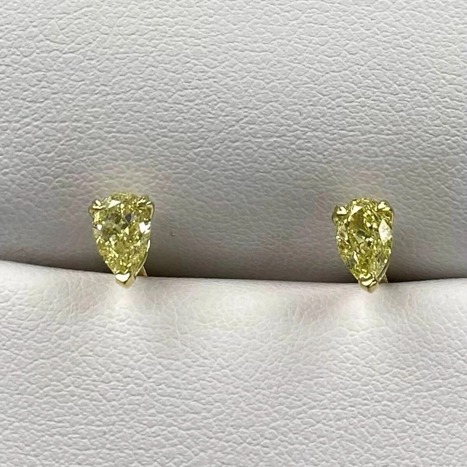 Aretes de diamantes amarillos vivos de lujo cultivados en laboratorio con corte de pera de 2 quilates de oro amarillo de 14 k Foto 2 de 4