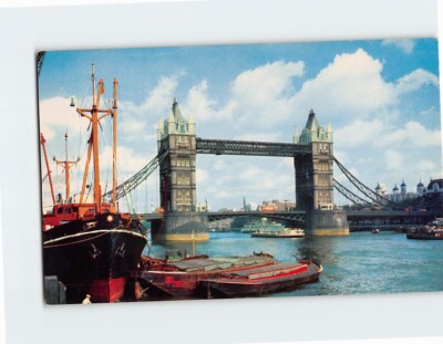 Postcard Tower Bridge over the Thames River with Tower of London Beyond England