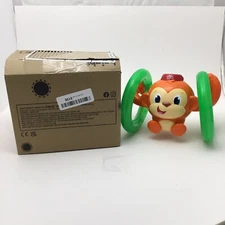 Kids II Bright Stars rolling monkey children's light up musical toy.