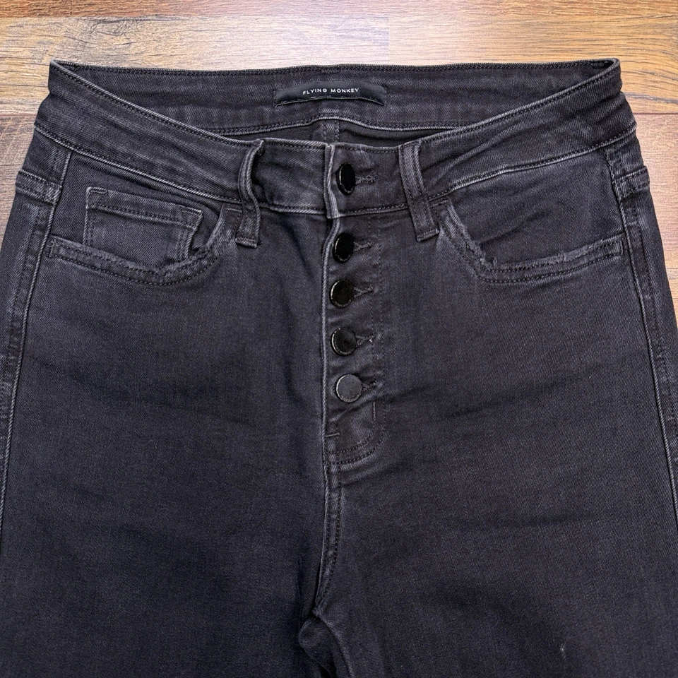 Pantalones de mezclilla Flying Monkey tiro alto súper acampanados para mujer 28 dobladillos deshilachados negros elásticos  Foto 3 de 4