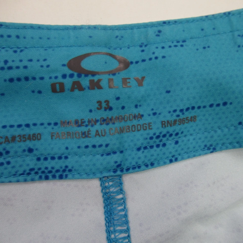 Pantalones Cortos Oakley Para Hombre Talla 33 Azul Bolsillo Botón Ligeros Aire Libre Playa Foto 3 de 4