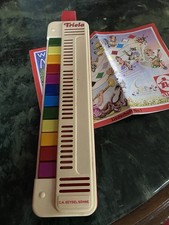 Triola 12 und Ein Liederheft mit Noten und ei...