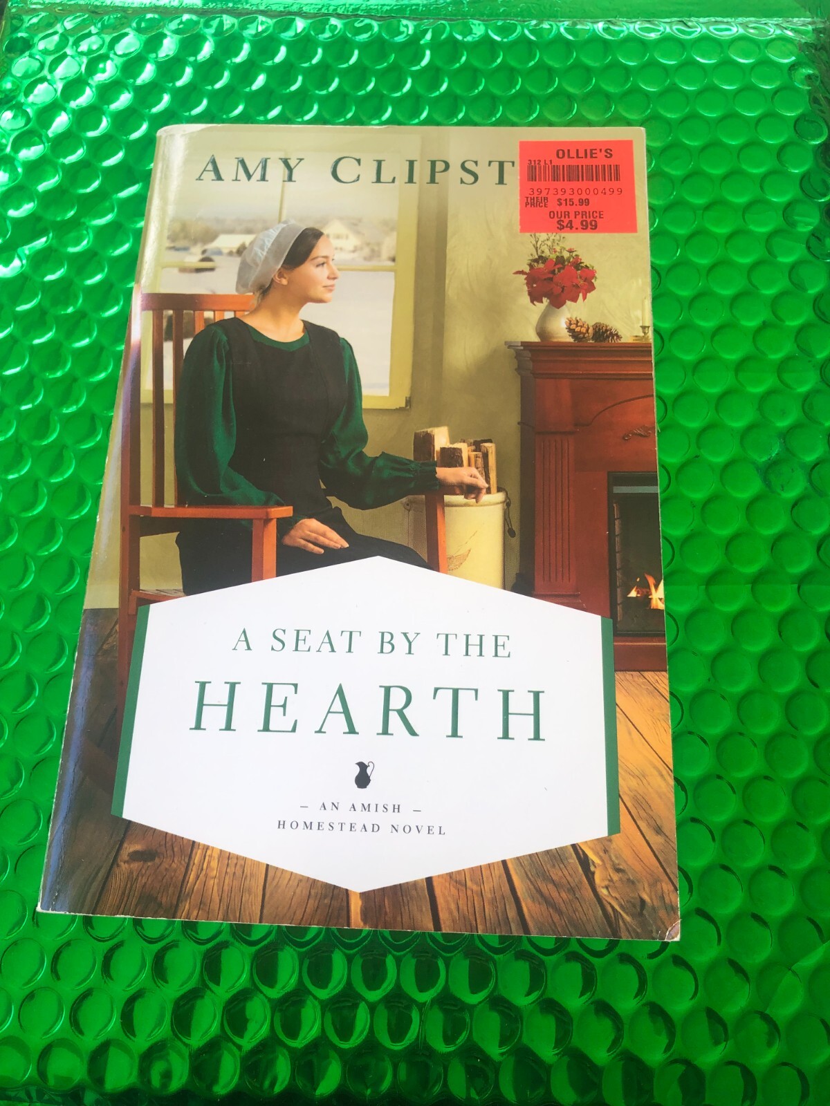 Cozy Up with A Seat at the Hearth by Amy Clipston