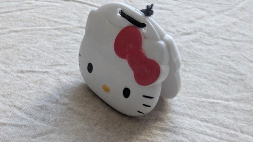 Sanrio Hello Kitty Noise maker er Box White Hinged Case w/ Lanyard Red Bow
