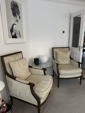 Dining Room Chairs Set Of Two. Dark Wood With Light Soft Yellow covering.