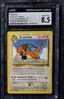 1999 😺 CGC 8.5 Dragonite #5 Mewtwo Strikes Back Pokemon Black Star Promo