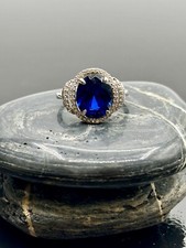 Blue Oval CZ Ring With CZ Finish Around Stone Sterling Silver