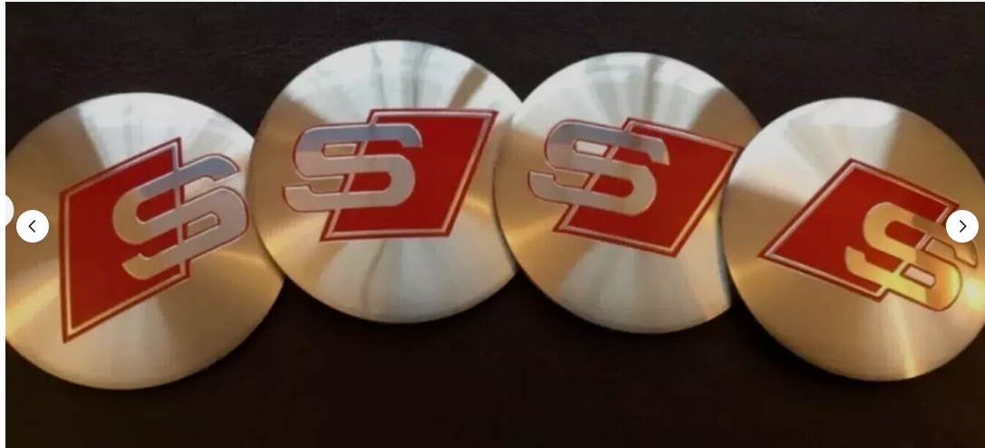 Set of 4 Universal Wheel center caps, 60mm bases & 56mm Silver Audi Stickers