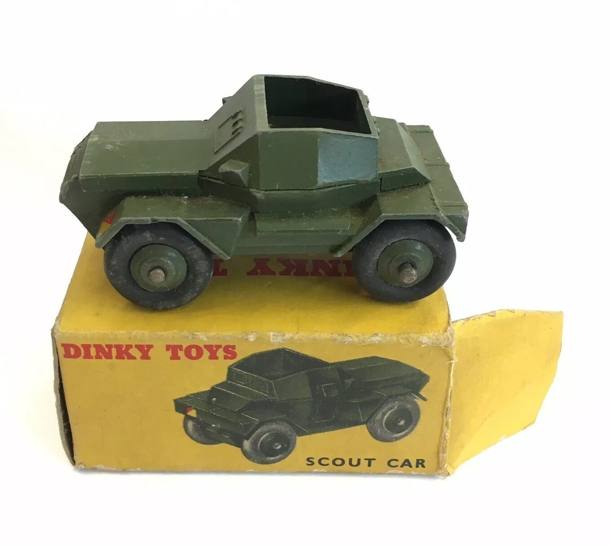 Dinky - 3 x military vehicles, a boxed Scout Car # 673 Dinky - 3 x military vehicles, a boxed Scout Car # 673