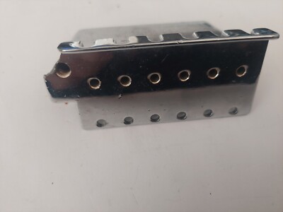 Unbranded 6 point Stratocaster Vibrado Tailpiece Base has chip