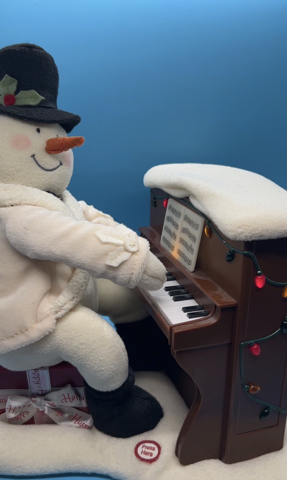 hallmark singing snowman playing piano