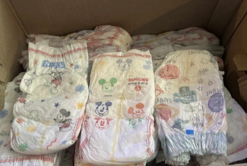 55 Pañales Mixtos Pampers y Huggies Talla 5 Niñas Caja Abierta Desechables Foto 2 de 4