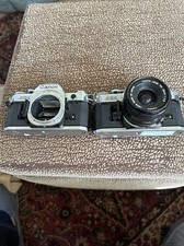 Canon AE-1 35mm SLR Film Camera with Canon 50mm f/1.8 FD Lens - Lot Of Two