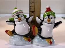 Vintage  Salt and Pepper Shaker set  Penguins on ice skates anamorphic ceramic