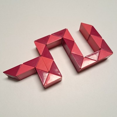 vintage 1980's Rubik's Snake Puzzle Toy Japan Twist Shape Game Pink Red Cube