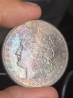 1881-S TONED MORGAN SILVER DOLLAR AU+