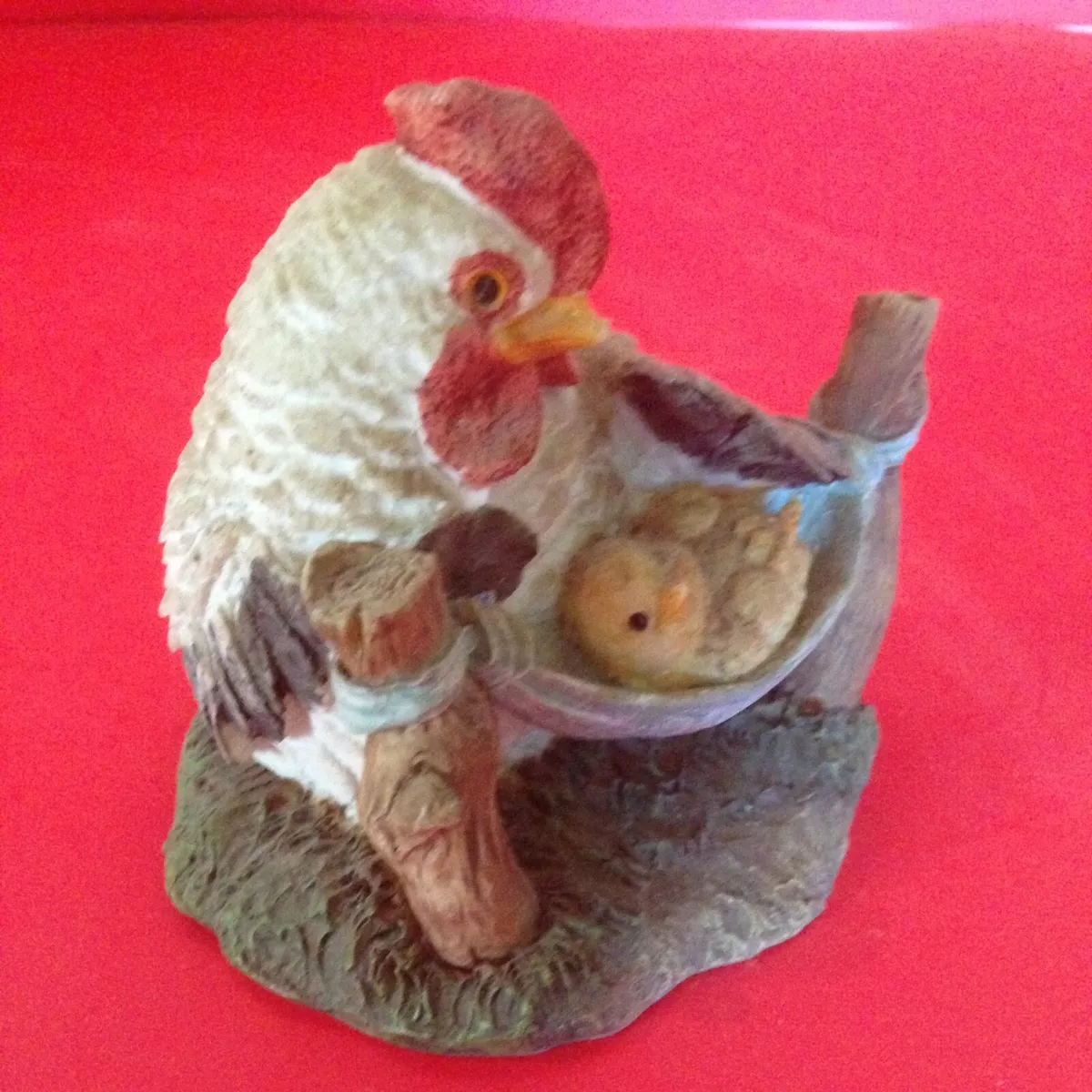 Figurine of Black White Chicken Hen Watching Her Chick Swing in