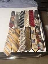 Lot of 12 men  s neck ties in used condition 