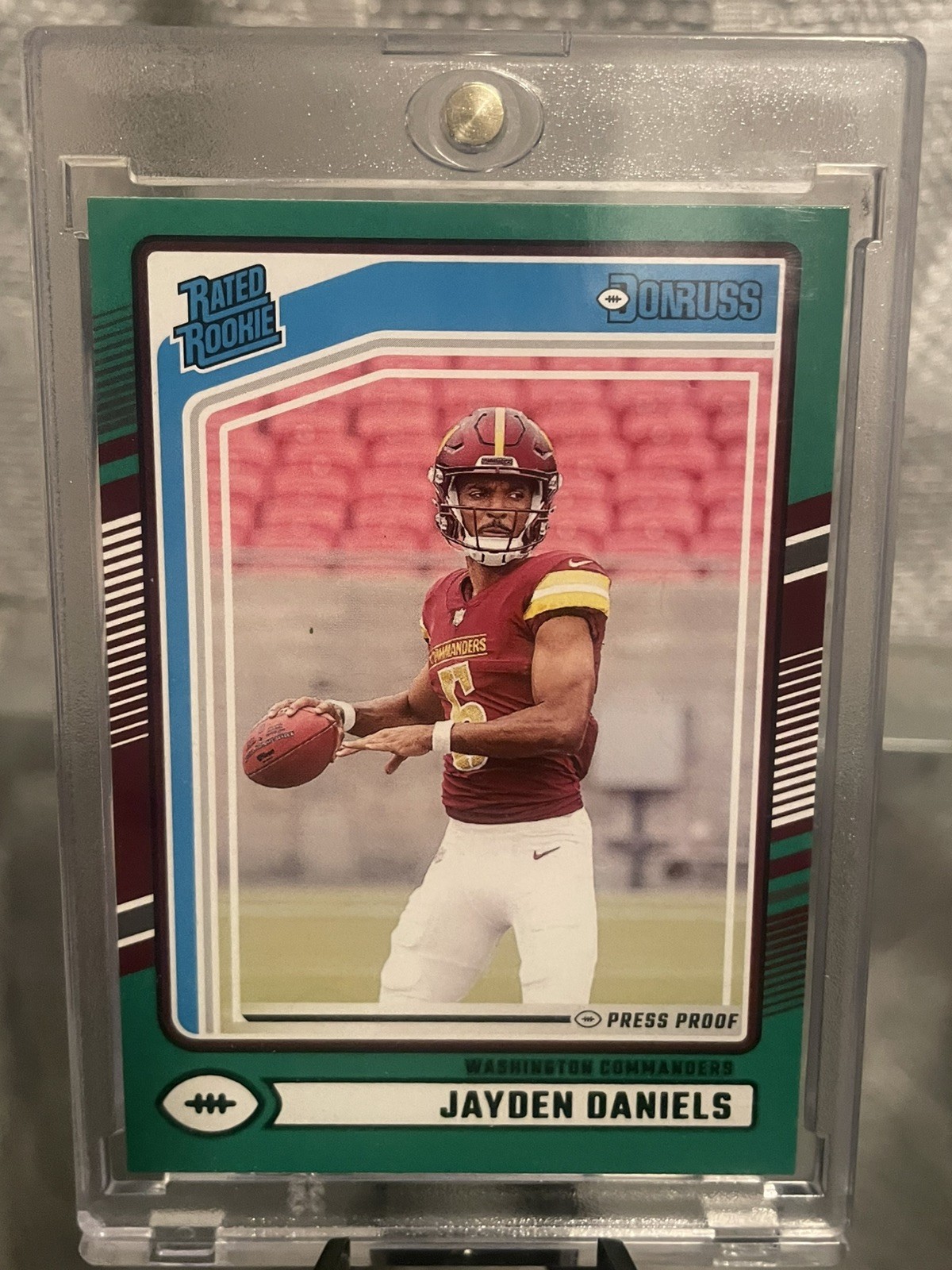 2024 Panini Donruss - Rated Rookie Jayden Daniels #389 Press Proof Green (RC)