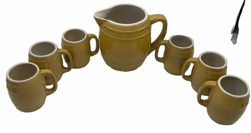 Vintage UHL Pottery Barrel Style Pitcher 7.25” And Set Of 6 Mugs/ Steins Yellow