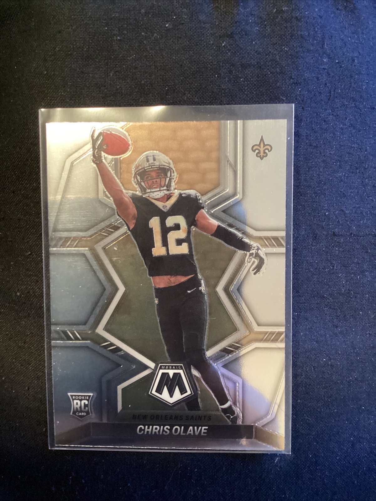 2022 Panini Mosaic Chris Olave Rookie #313 Saints. JT13