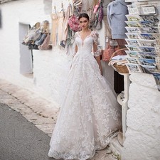 Luxury ALine V-Neck Wedding Dresses Lace Applique Half Sleeve Train Bridal Gowns