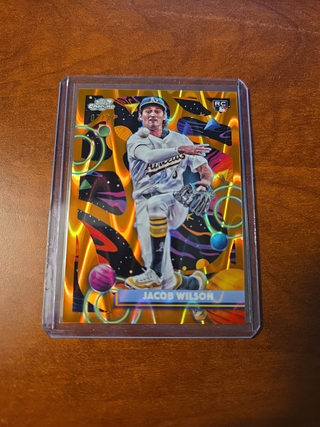2025 Topps Cosmic Chrome, Jacob Wilson #139 Orange Galactic Refractor /25 A's RC