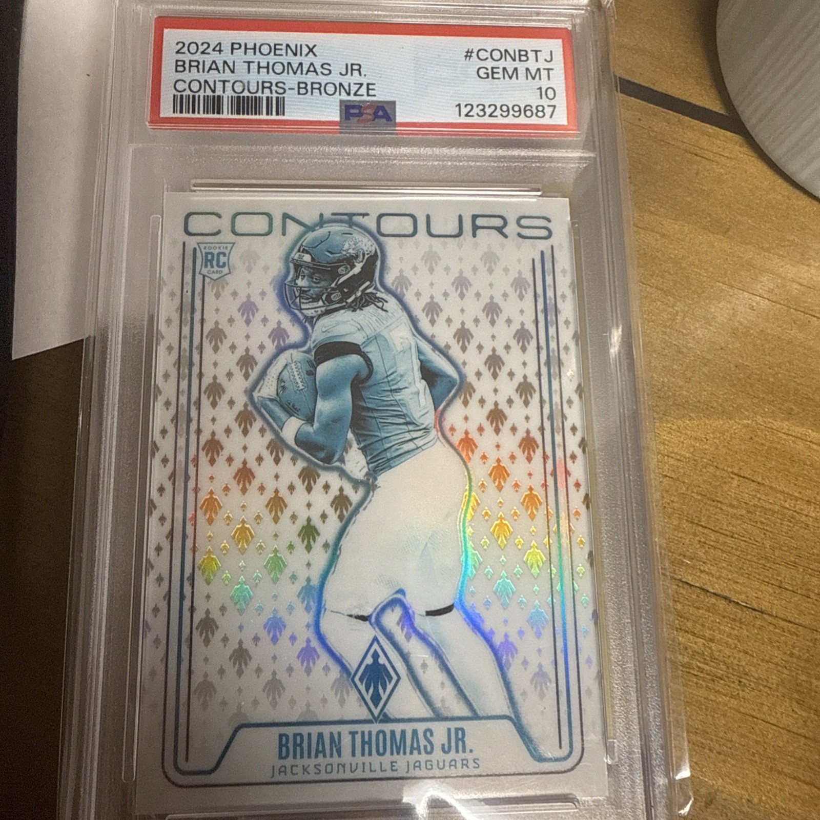 2024 Panini Phoenix - Contours Brian Thomas Jr. #CON-BTJ Bronze /75 (RC)