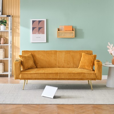 The straight-row white corduroy sofa with throw pillows, featuring a minimalist