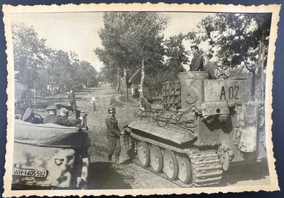 German heavy tank Panzerkampfwagen VI Ausf. E (Tiger I) on a dirt road.