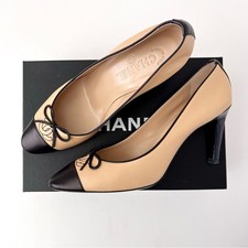 CHANEL  Beige and Black Cap Toe Pumps Interlocking CC Logo with Bow EU 38.5