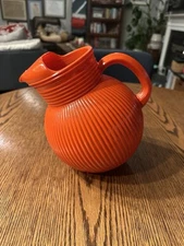 Hazel Atlas Fine Rib Orange Tilt Ball Pitcher  6 1/2" Tall 40 oz