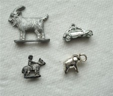 LOT OF 4 MINIATURE METAL FIGURES, GOAT, HORES  RIDER, AUTO, ELEPHANT