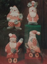 Vintage Sunset Antiqued Quilts Christmas Santa Quartet NIP