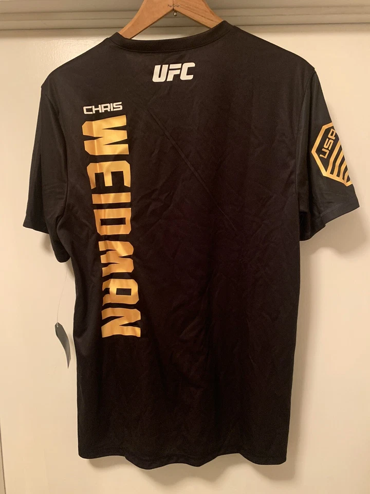 Nuevo Chris Weidman Reebok UFC Fight Kit Jersey Campeón Negro Dorado Camiseta Talla L Foto 2 de 4