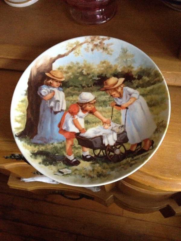 Bradex Knowles       Office Hours  Decorative Plate Playing Nurse