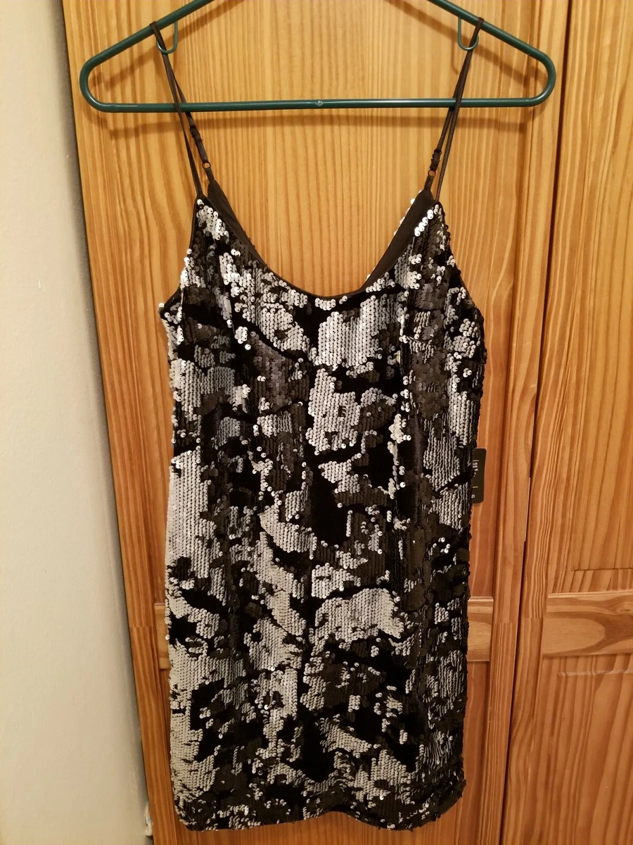 Jolie robe noire à paillettes charleston