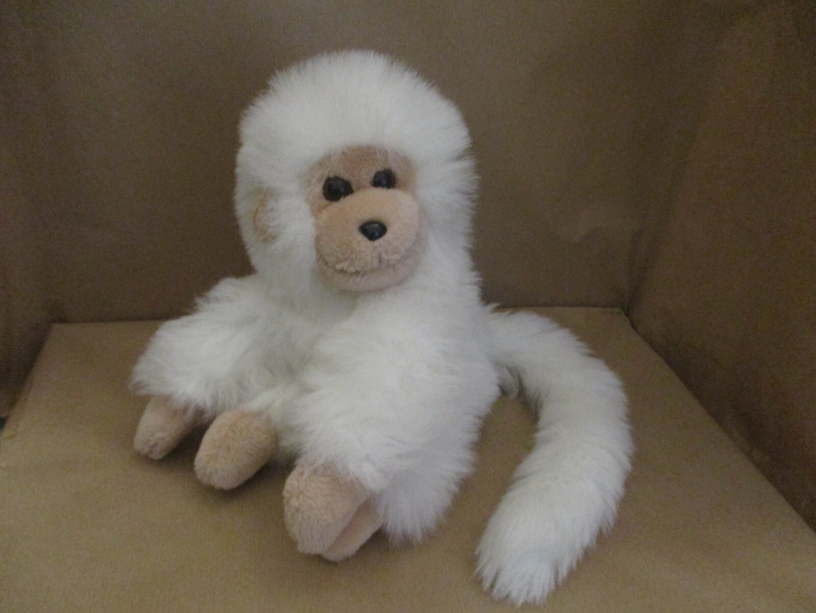 white plush monkey