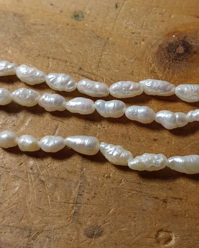 Natural White Fresh Water Pearl Rice Shape Bead 6.5mm x 3mm 23 Inch Strand - Picture 2 of 2