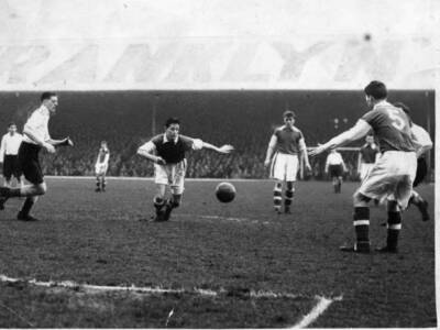 Cardiff City's Alan Harrington looks clear ball during game a- 1955 Old Photo
