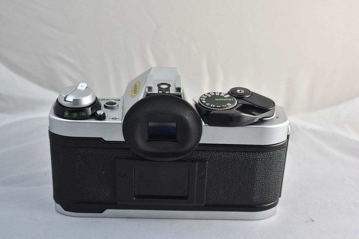 Canon AE-1 Program, mint, includes box, manual and paper Canon AE-1 Program, mint, includes box, manual and paper