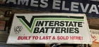 Authentic Vtg Interstate Battery Advertising Metal Sign  2'x5' Gas Oil Garage
