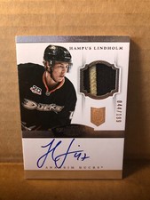 2013-14 Dominion #185 Hampus Lindholm JSY AU 44/199 RC