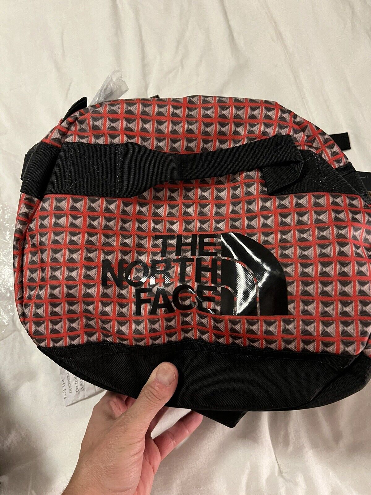Supreme North Face SS21 Studded Red Duffle Bag