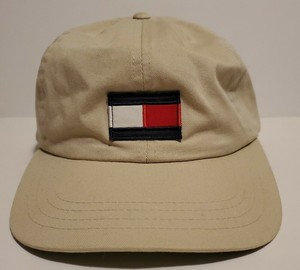 tan hat with leather strap
