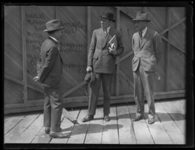 Captain Frank Hurley, Flying Officer S.J. Moir and another man, NS- Old Photo