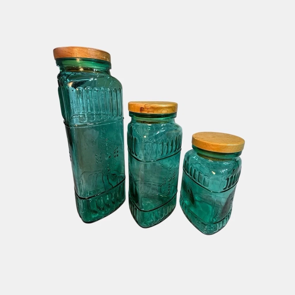 Vintage Turquoise Triangle Shaped Set Of Three Canister Set With Embossed Design
Opens in a new wind